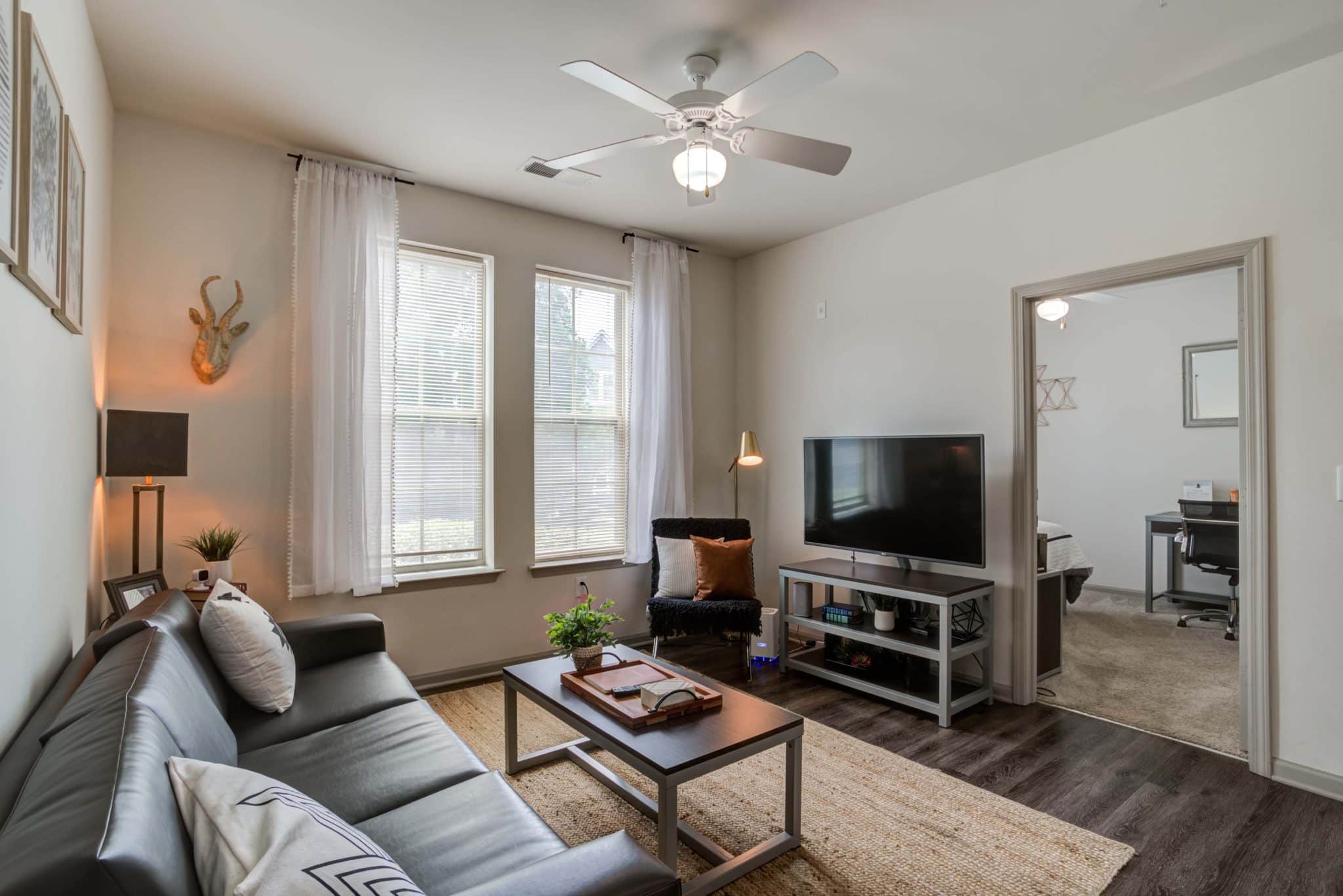 millennium one apartments near unc charlotte fully furnished living room